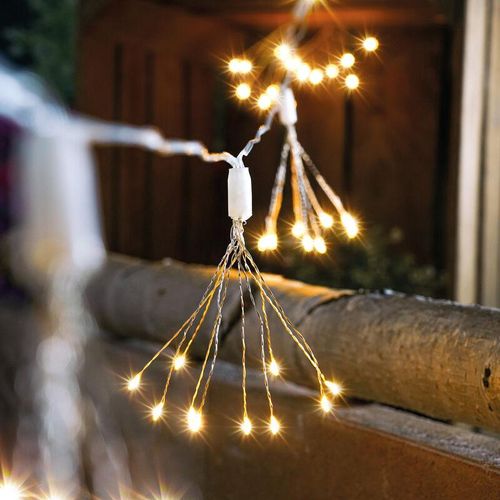 4260657634591 - Solar Deko-Lichterkette Wunderkerze Feuerwerk 10 tlg mit 100 LED - extrem lange Leuchtzeit im Winter - warmweißes LED Licht - esotec 102575