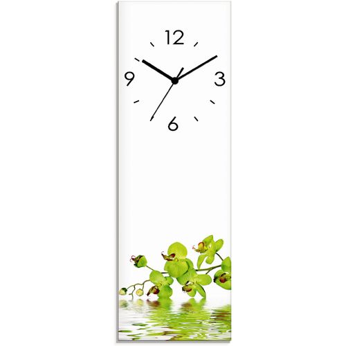 4062144286418 - Wanduhr ARTLAND Schöne Orchidee mit grünem Hintergrund Wanduhren Gr B H T 20 cm x 60 cm x 18 cm Funkuhr grün Wanduhren wahlweise mit Quarz- oder Funhuhrwerk lautlos ohne Tickgeräusche